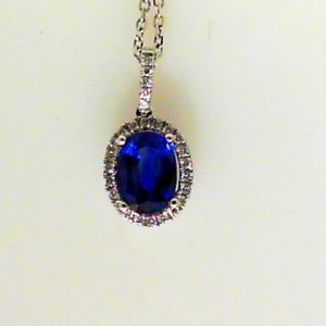 Sapphire Pendant 
18 Karat White Blue Sapphire Pendant 
 
1 Center Sapphire 1.56ct Shape: Oval; Colour: Blue Round Diamond 0.12 ctw