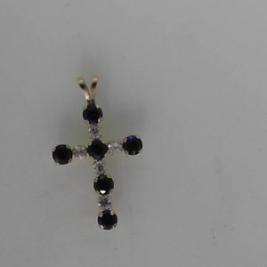 Cubic Zirconiums Estate Pendant 
14 Karat Yellow Blue Cubic Zirconiums Pendant 
Gram Weight 1.3 Chain Style: No Chain 
6 Center Cubic Zirconiums Shape: Round; Colour: Blue With 5 Round Cubic Zirconiums