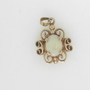 Opal Estate Pendant
14 Karat Yellow Opal Pendant
Gram Weight 1.35 Chain Style: No Chain
1 Center Opal Shape: Oval