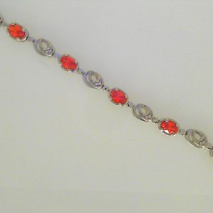 Estate Bracelet With **s 
14 Karat White White **s Bracelet Length: 7.5in Width: 5.97mm 
Gram Weight 10.42 
16 Center **s Shape: Round; Colour: White With 8 Oval **s