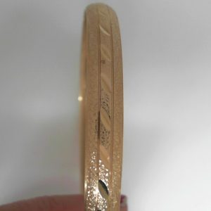 Yellow 10 Karat Engraved Bangle Estate Bracelet 
 
Gram Weight 9.17 gr