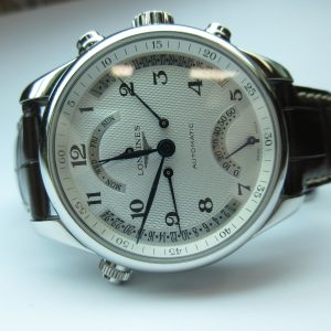 Gents Estate Watch - Misc Longines Chronograph 2015
Vendor Style #: Longines Master L2.715.4
41 StainlessSteel Strap 
Dial:Textured White
Box Included/Papers Included
Condition 1 Owner All Orig. Hardly Worn MSRP $4900.00 USD
1 Year Warranty