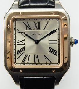 Cartier Santos Dumont XL 242343AX 4305 on strap with box and papers.
Estate Watch - Misc Cartier Dress 
Vendor Style #: 4305 242343AX
 StainlessSteel Strap 
Dial:
Box Included/Papers Included
Condition 
1 Year Warranty