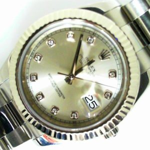 Estate Rolex Dress Year: 2009
Vendor Style #: 116334 Datejust 41 diamond dial SN: V705925 Oyster
41mm 18K/Stainless Steel
Dial: SIlver diamond 
Box Included/Papers Included
Condition Good
1 Year Warranty