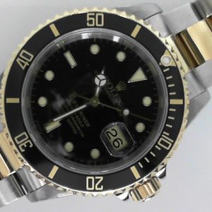 Estate Rolex Divers Year: 1991
Vendor Style #: 16613 Submariner SN: X298542 Oyster
40mm 18K/Stainless Steel
Dial: Black plots 
Box Included/Papers Included
Condition Very good
1 Year Warranty