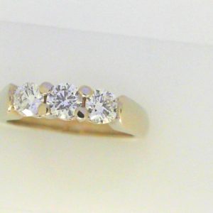 Diamond Engagement Ring 
14 Karat White Engagement Ring 0.6twt
Finger Size 5 Gram Weight 3.8gram weight Width: 2.1 
3 Center Diamonds Shape: Round Clarity: I1 Colour: H 0.6