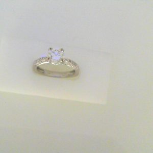Diamond Engagement Ring 
19 Karat White Engagement Ring 1.19twt
Finger Size 7 
1 Center Diamond 0.90ct Shape: Round Clarity: VS1 Colour: G With 38 Round Diamonds 0.29 ctw 1.19