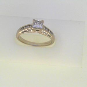 Estate Diamond Engagement Ring 
18 Karat White Estate Engagement Ring 
Finger Size 7 Gram Weight 3.9 
 Center Diamond Shape: Various Shapes; Clarity: I1; Colour: I/J 0.5