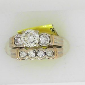 Estate Diamond Engagement Ring 
14 Karat Yellow/White Estate Engagement Ring 
Finger Size 4.75 Gram Weight 9.1