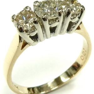 Estate Diamond Engagement Ring 
14 Karat Yellow/White Estate Engagement Ring 
Finger Size 5.5 Gram Weight 3.2 
 Center Diamond Shape: Round; Clarity: I1; Colour: M/N 0.79