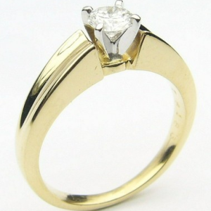 Estate Diamond Engagement Ring 
18K/Platinum Yellow/White Estate Engagement Ring 
Finger Size 4.5 Gram Weight 4.1 
1 Center Diamond 0.25ct Shape: Round; Clarity: VS2; Colour: E/F 0.25