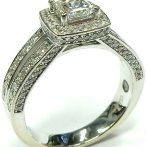 Estate Diamond Engagement Ring
14 Karat White Estate Engagement Ring
Finger Size 7 Gram Weight 6.6
1 Center Diamond 0.56ct Shape: Princess; Clarity: SI2; Colour: H With 116 Round Diamonds 0.86 ctw 1.42