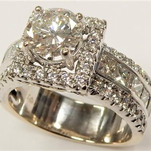 Estate Diamond Engagement Ring
14 Karat White Estate Engagement Ring
Finger Size 6.75 Gram Weight 7.7
10 Center Diamonds Shape: Princess; Clarity: VS; Colour: H With 1 Round Diamond 1.03 ctw 2