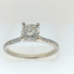 Estate Diamond Engagement Ring
14 Karat White Estate Engagement Ring
Finger Size 7.5 Gram Weight 2.3
1 Center Diamond 0.64ct Shape: Round; Clarity: I2; Colour: I With 18 Round Diamonds 0.10 ctw 0.74