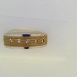 Diamond Ring- Men's 
10 Karat Yellow/White Men's Diamond Ring 
Finger Size 10 Gram Weight 7.51 
5 Center Diamonds Shape: Round 0.07