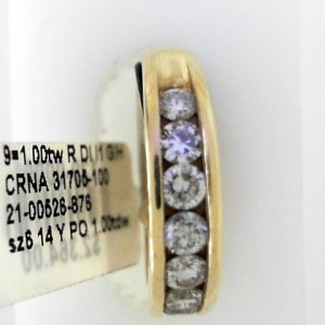 Diamond Wedding/Anniversary Ring 
14 Karat Yellow Wedding/Anniversary Ring Width 5mm 
Finger Size 6 
9 Center Diamonds Shape: Round; Clarity: I1; Colour: G/H 1