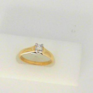 Diamond Wedding/Anniversary Ring 
14 Karat Yellow Wedding/Anniversary Ring 
Finger Size 7 
1 Center Diamond 0.33ct Shape: Princess With 1 Princess Diamond 0.25 ctw 0.58