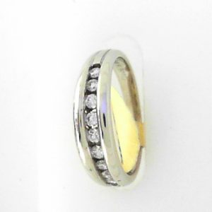 Estate Diamond Anniversary Ring 
14 Karat White Estate Anniversary Ring Width 5.25mm 
Finger Size 6 Gram Weight 3.3 
9 Center Diamonds Shape: Round; Clarity: I1; Colour: G 0.2