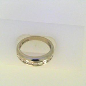 Estate Diamond Anniversary Ring 
14 Karat White Estate Anniversary Ring Width 2.8mm 
Finger Size 6 Gram Weight 3.3 
10 Center Diamonds Shape: Round; Clarity: SI1; Colour: I 0.5