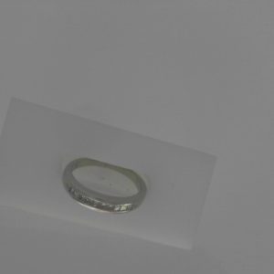 Estate Diamond Anniversary Ring 
Platinum White Estate Anniversary Ring 
Finger Size 6.25 Gram Weight 4.6 
 Center Diamond Shape: Princess; Clarity: SI; Colour: I 0.25