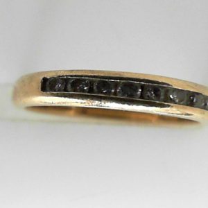 Estate Diamond Anniversary Ring
14 Karat Yellow Estate Anniversary Ring
Finger Size 4.5 Gram Weight 1.8
9 Center Diamonds Shape: Round; Clarity: I1; Colour: I 0.2