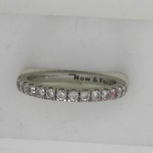 Estate Diamond Anniversary Ring 
18 Karat White Estate Anniversary Ring 
Finger Size 6 Gram Weight 2.4 
32 Center Diamonds Shape: Round; Clarity: VS; Colour: H/I 0.75