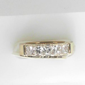 Estate Diamond Anniversary Ring 
14 Karat Yellow Estate Anniversary Ring 
Finger Size 4.5 Gram Weight 4.26 
5 Center Diamonds Shape: Princess; Clarity: VS; Colour: G/H 0.73