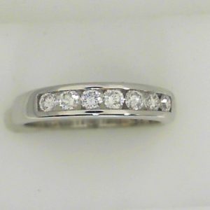 Estate Diamond Anniversary Ring 
18 Karat White Estate Anniversary Ring Width 3mm 
Finger Size 6.25 Gram Weight 3.3 
7 Center Diamonds Shape: Round; Clarity: SI; Colour: H/I 0.4