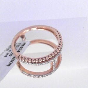 Diamond Dinner Ring - Women's 
10 Karat Rosé Dinner Ring Width 4.24mm 
Finger Size 6.5 
100 Center Diamonds Shape: Round 0.2