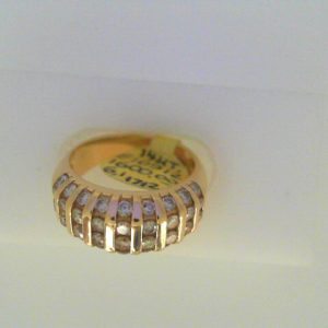 Estate Diamond Dinner Ring - Women's 
14 Karat Yellow Estate Dinner Ring Width 4.5mm 
Finger Size 6 Gram Weight 6.1 
36 Center Diamonds Shape: Round; Clarity: I1; Colour: J/K 1