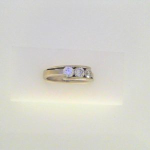 Estate Diamond Dinner Ring - Women's
14 Karat White Estate Dinner Ring
Finger Size 8.5 Gram Weight 5.6
3 Center Diamonds Shape: Round; Clarity: I1; Colour: H/I 1