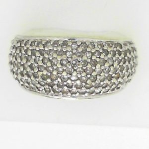 Estate Diamond Dinner Ring - Women's 
14 Karat White Estate Dinner Ring 
Finger Size 7 Gram Weight 7.8 
146 Center Diamonds Shape: Round; Clarity: I2; Colour: I 0.75