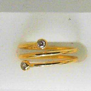 Tiffany & Co. Estate Diamond Dinner Ring - Women's 
18 Karat Yellow Estate Dinner Ring 
Finger Size 6 Gram Weight 2.33 
2 Center Diamonds Shape: Round