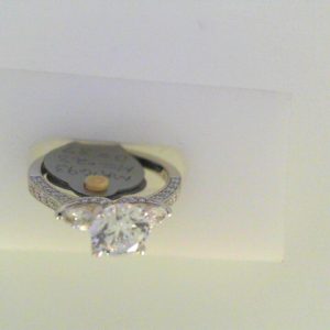 Diamond Semi-Mount Ring 
18 Karat White Ring 
Finger Size 6 
2 Center Diamonds Shape: Marquise; Clarity: VS1; Colour: F/G Round Diamond 0.37 ctw 0.6