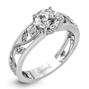 Diamond Semi-Mount Ring 
18 Karat White Ring 
Finger Size 7 
 Center Diamond Shape: Round; Clarity: VS1; Colour: F/G 0.09