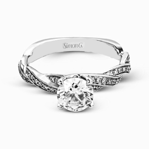 Diamond Semi-Mount Ring 
18 Karat White Ring 
Finger Size 7 
 Center Diamond Shape: Round; Clarity: VS1; Colour: F/G 0.23