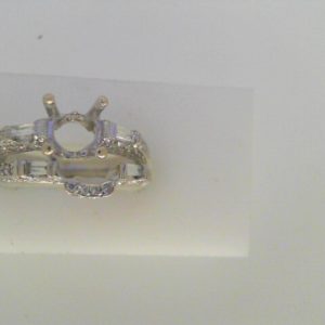 Estate Diamond Semi-Mount 
14 Karat White Estate Semi-Mount Ring 
Finger Size 7.5 Gram Weight 5.6 
106 Center Diamonds Shape: Various Shapes; Clarity: SI1; Colour: H 0.75