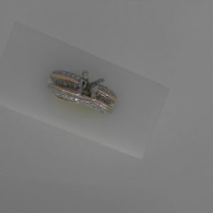 Estate Diamond Semi-Mount 
18 Karat Rose/White w/Palladium Estate Semi-Mount Ring 
Finger Size 7.25 Gram Weight 7.13 
 Center Diamond Shape: Round; Clarity: VS-SI; Colour: G/H