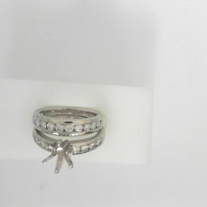 Estate Diamond Semi-Mount 
Platinum White Estate Semi-Mount Ring 
Finger Size 7 Gram Weight 14.7 
18 Center Diamonds Shape: Round; Clarity: SI; Colour: G/H 0.94