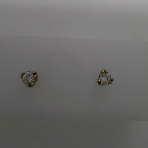 Diamond Earrings 
14 Karat White Diamond Earrings 
 
2 Center Diamonds Shape: Round Clarity: VS2 Colour: G 0.49