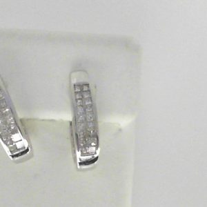 Diamond Earrings 
14 Karat White Diamond Earrings 
 
36 Center Diamonds Shape: Round 0.76