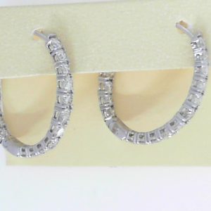 Diamond Earrings 
14 Karat White Diamond Earrings 
Gram Weight 5.92 
36 Center Diamonds Shape: Round 2.88