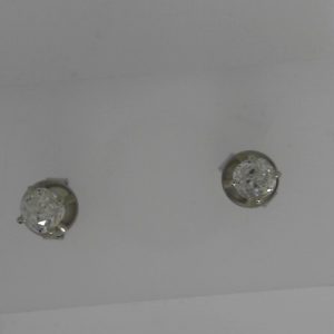 Estate Diamond Earrings
14 Karat White Estate Diamond Earrings
2 Center Diamonds 0.36ct Shape: Old Mine Cut; Clarity: I2; Colour: I/J 0.72