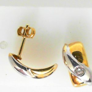 Estate Diamond Earrings 
18 Karat Yellow/White Estate Diamond Earrings 
Gram Weight 4.26 
2 Center Diamonds 2.40ct Shape: Round; Clarity: SI1; Colour: I/J 0.1