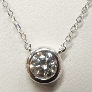 Diamond Pendant/Necklace 
14 Karat White Diamond Pendant 
 Length: 18in 
1 Center Diamond 0.32ct Shape: Round 0.32