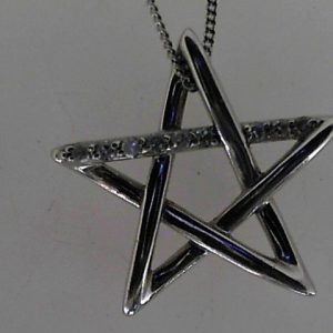 Diamond Pendant/Necklace 
10 Karat White Diamond Pendant 
Gram Weight 2.8 Chain Style: Curb 10 Karat White Length: 18in 
9 Center Diamonds Shape: Round 0.081