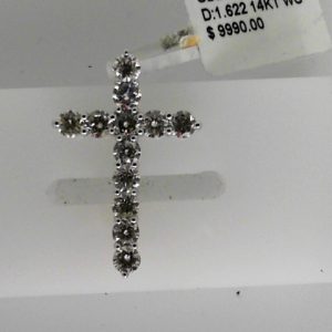 Diamond Pendant/Necklace 
14 Karat White Diamond Pendant 
Gram Weight 2.15 Chain Style: No Chain 
12 Center Diamonds Shape: Round 1.6