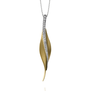 Diamond Pendant/Necklace 
18 Karat Yellow/White Diamond Pendant 
 Chain Style: Cable Link 18 Karat White Length: 18in 
15 Center Diamonds Shape: Round; Clarity: VS1; Colour: F/G 0.11
