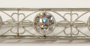 Estate Diamond Pendant/Necklace 
Platinum White Estate Diamond Pendant 
Gram Weight 7.4 Chain Style: No Chain 
5 Center Diamonds Shape: Round; Clarity: VS; Colour: E/F 2.5