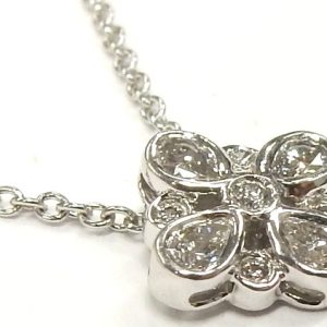 Estate Diamond Pendant/Necklace 
Platinum White Estate Diamond Pendant 
Gram Weight 2.66 Chain Style: Cable Link Platinum White 16 
4 Center Diamonds Shape: Pear; Clarity: VS; Colour: G/H With 5 Round Diamonds 0.03 ctw 0.19